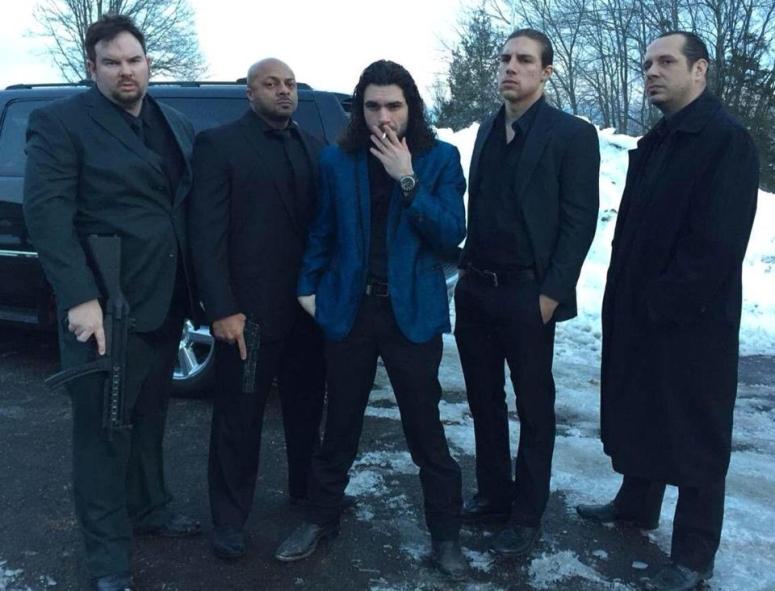 Mike (far left) dressed by Gianni for Men